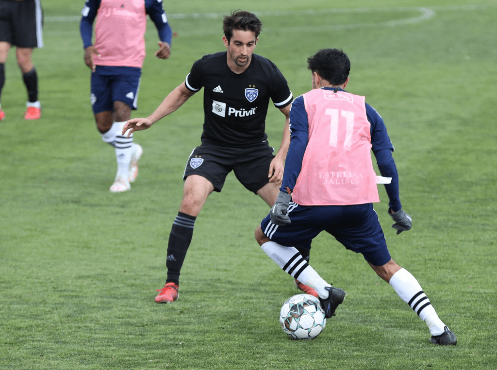 game action between Louisville City FC and El Paso Locomotive